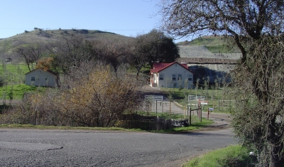 Cabral Ranch buildings. Carneros Vintners winery site above red roof.