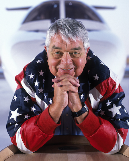 Koerner Rombauer with his airplane and a wine barrel at the Napa Valley Airport, California, October 12, 2004.